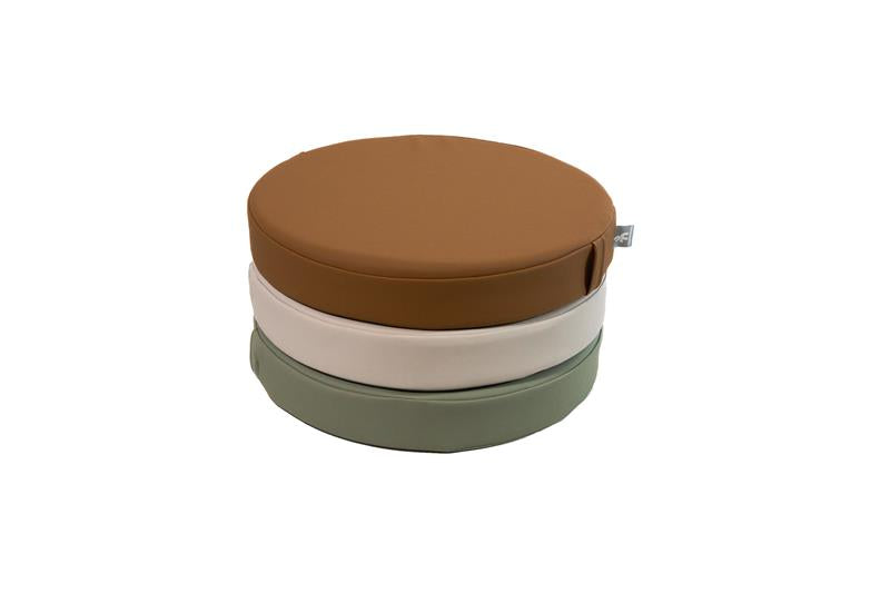 White sweep photo of a stack Foamnasium Roundabouts in Nutmeg, Auster, and Seagrass.