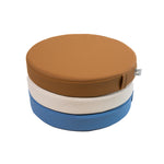 White sweep photo of a stack Foamnasium Roundabouts in Nutmeg, Auster, and Erie.