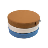 White sweep photo of a stack Foamnasium Roundabouts in Nutmeg, Auster, and Erie.