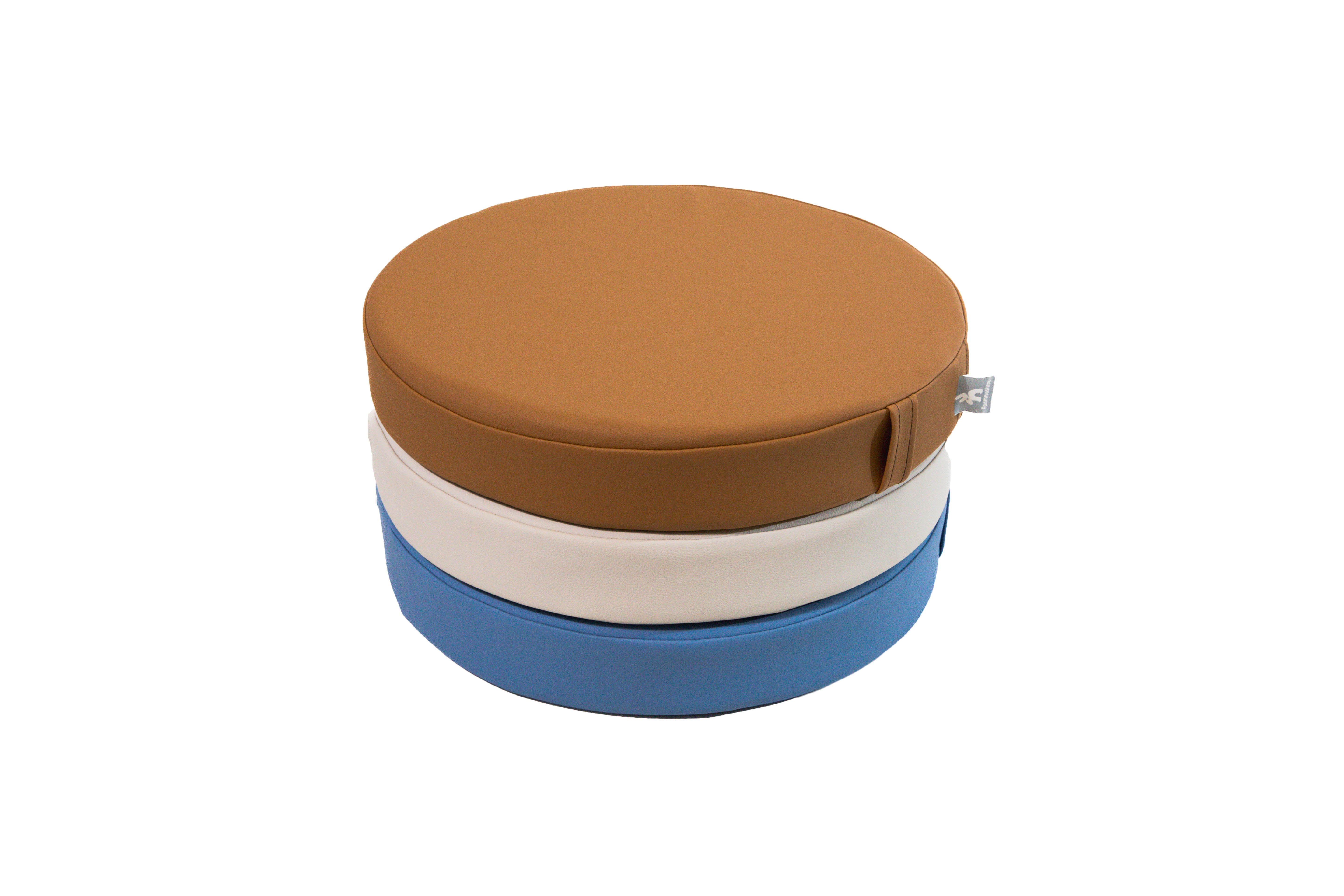 White sweep photo of a stack Foamnasium Roundabouts in Nutmeg, Auster, and Erie.