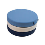 White sweep photo of a stack Foamnasium Roundabouts in Erie, Auster, and Ink.