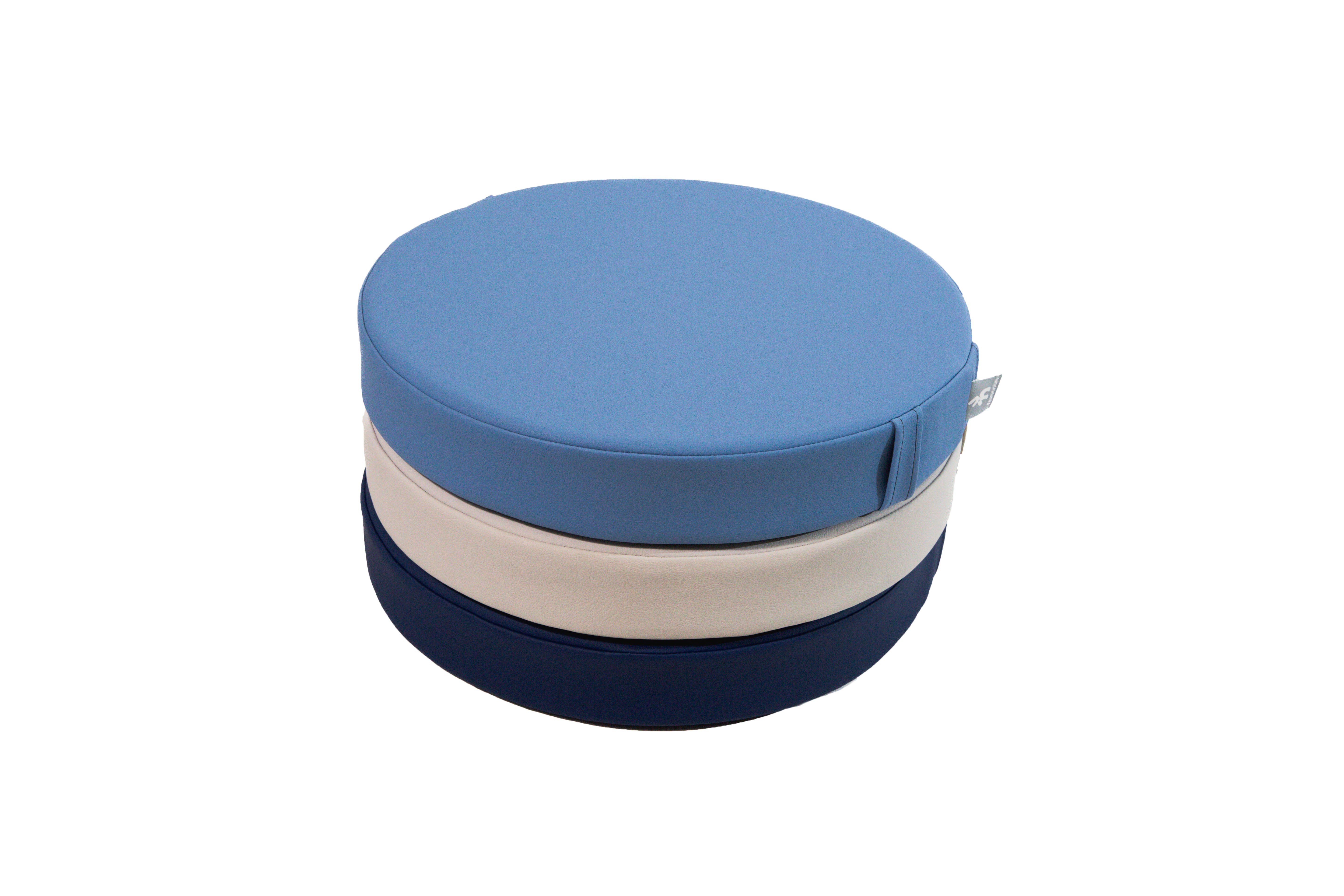 White sweep photo of a stack Foamnasium Roundabouts in Erie, Auster, and Ink.