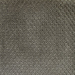 Close-up of a textured sage fabric with a herringbone pattern