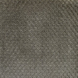 Close-up of a textured sage fabric with a herringbone pattern