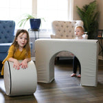 Lifestyle photo of two girls playing with a Gull Gray Foamnasium Arch.