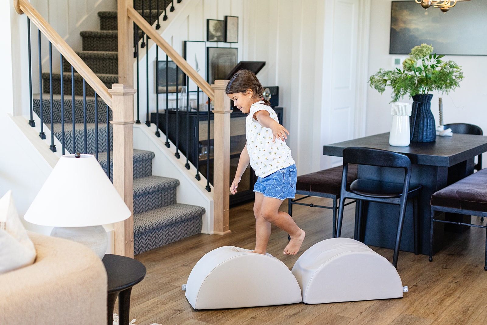 Child walking on Foamnasium mini tumblers in Auster