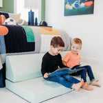 Lifestyle Photo of two boys reading on an Enhanced Sage Blocksy Mini