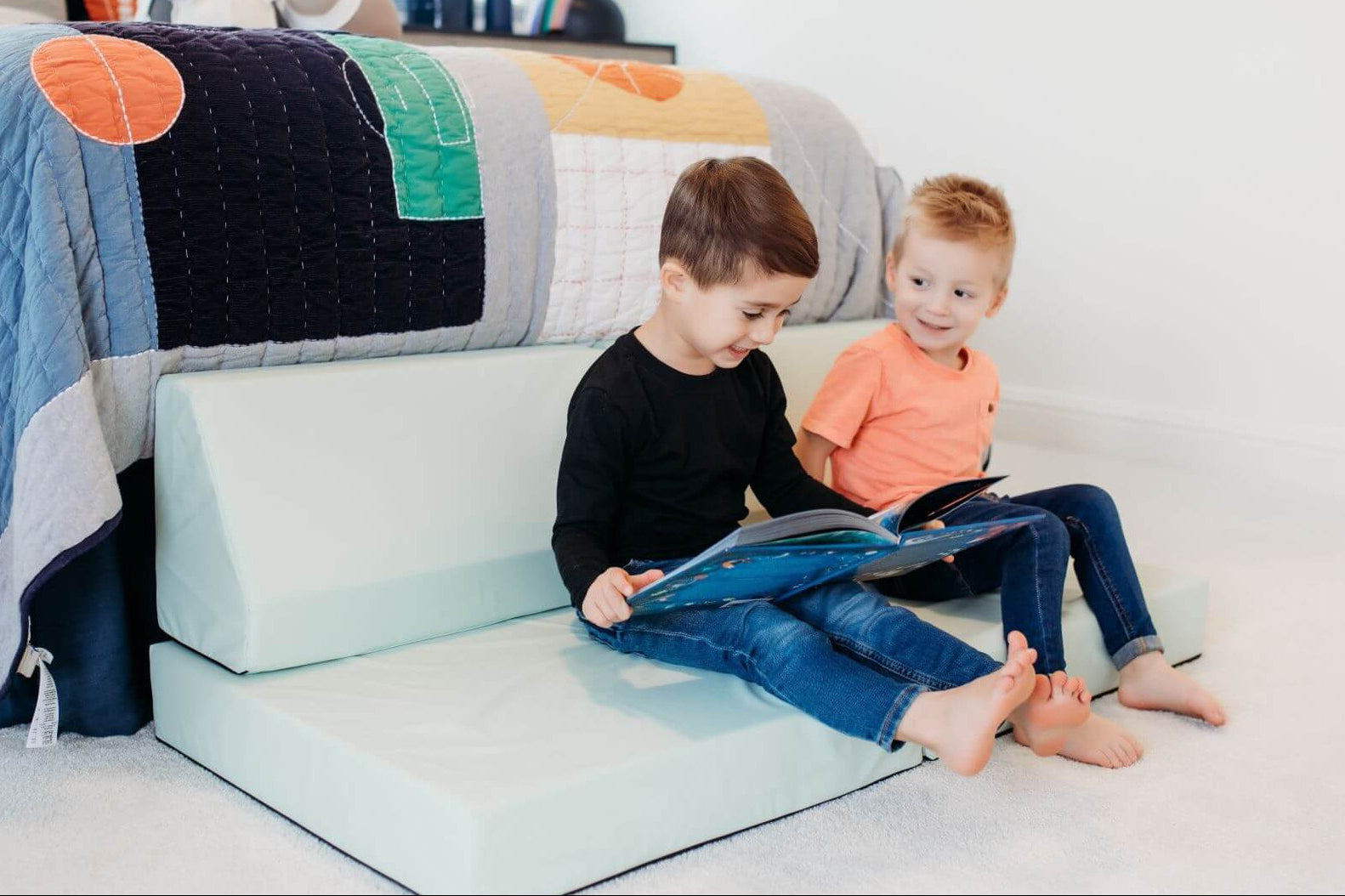 Lifestyle Photo of two boys reading on an Enhanced Sage Blocksy Mini
