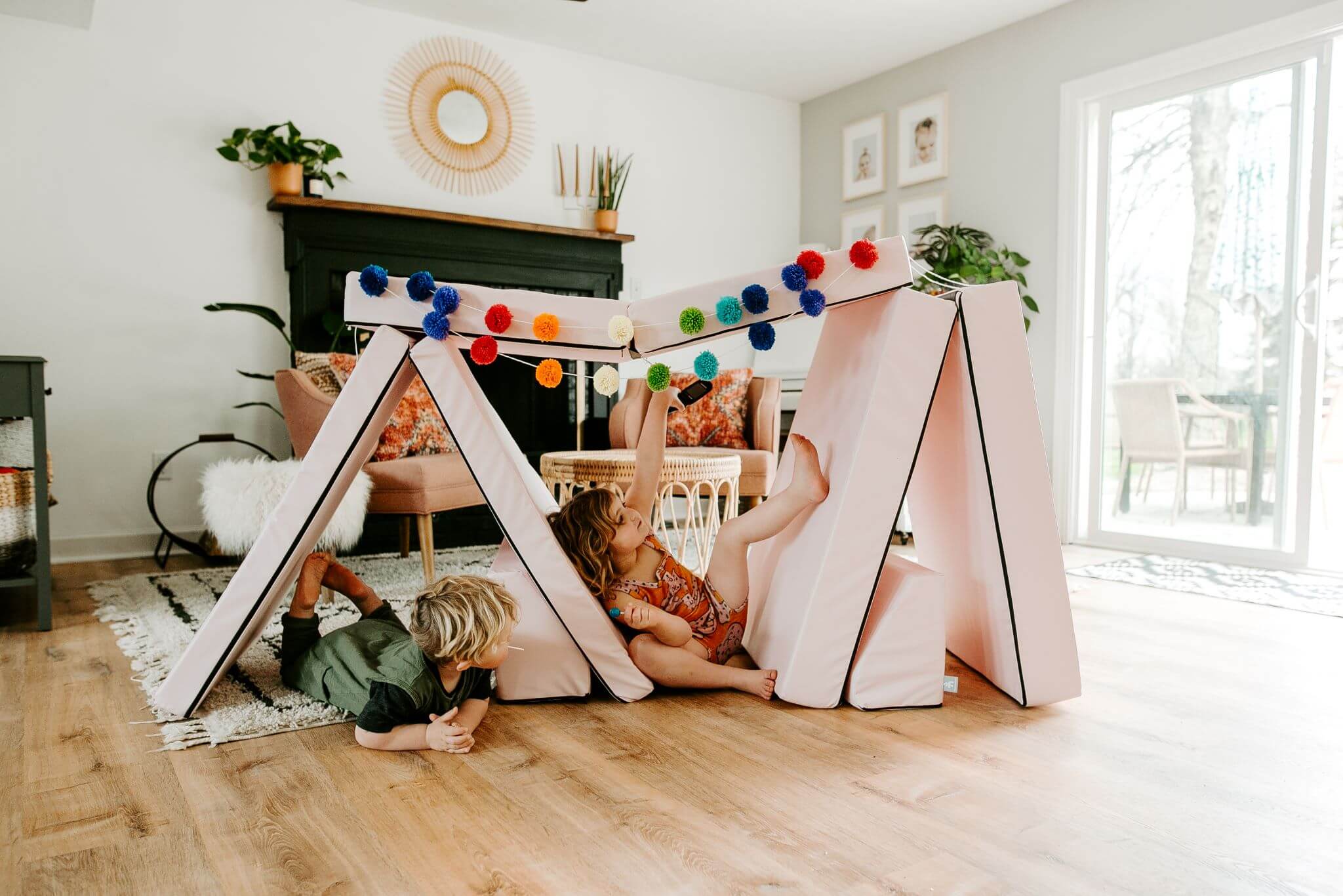 Lifestyle photo of two kids playing on a Pink Blocksy