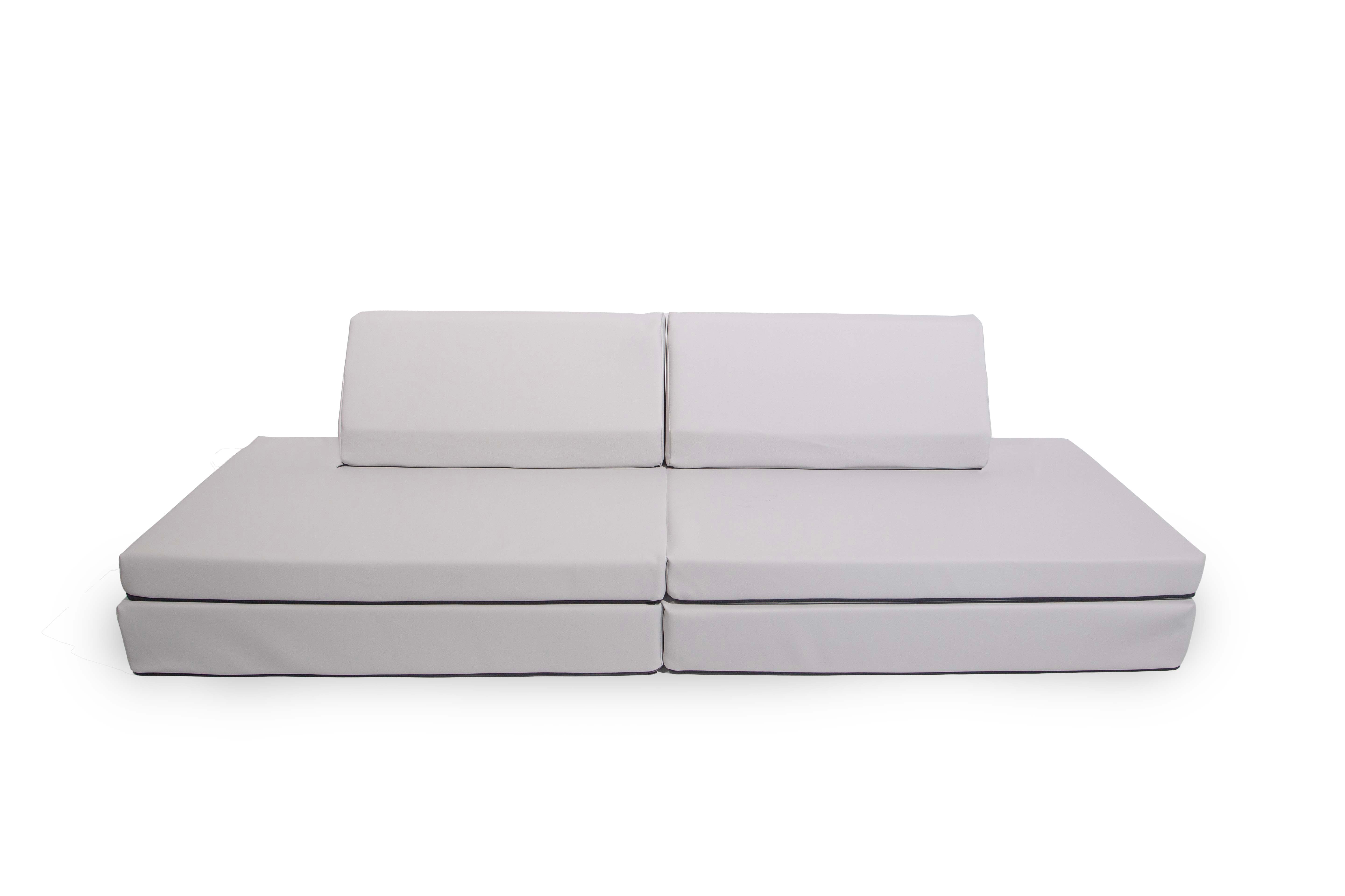 Mint/light green modular sofa with two back cushions, pastel color.