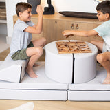 Lifestyle photo of two boys playing on an Auster Foamnasium Blocksy+