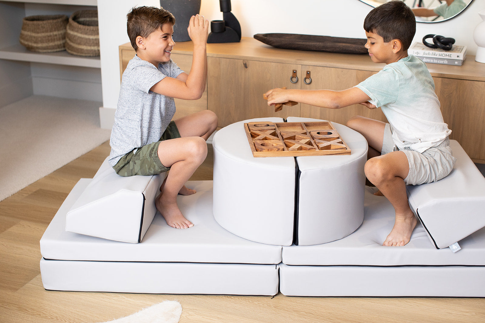 Lifestyle photo of two boys playing on an Auster Foamnasium Blocksy+