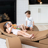 Lifestyle photo of two kids playing on a nutmeg blocksy+