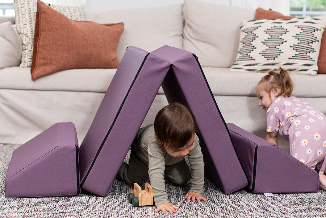 Two kids crawling through Foamnasium Blocksy Mini in Bohemian