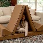 Girl peeking out of Foamnasium Blocksy teepee