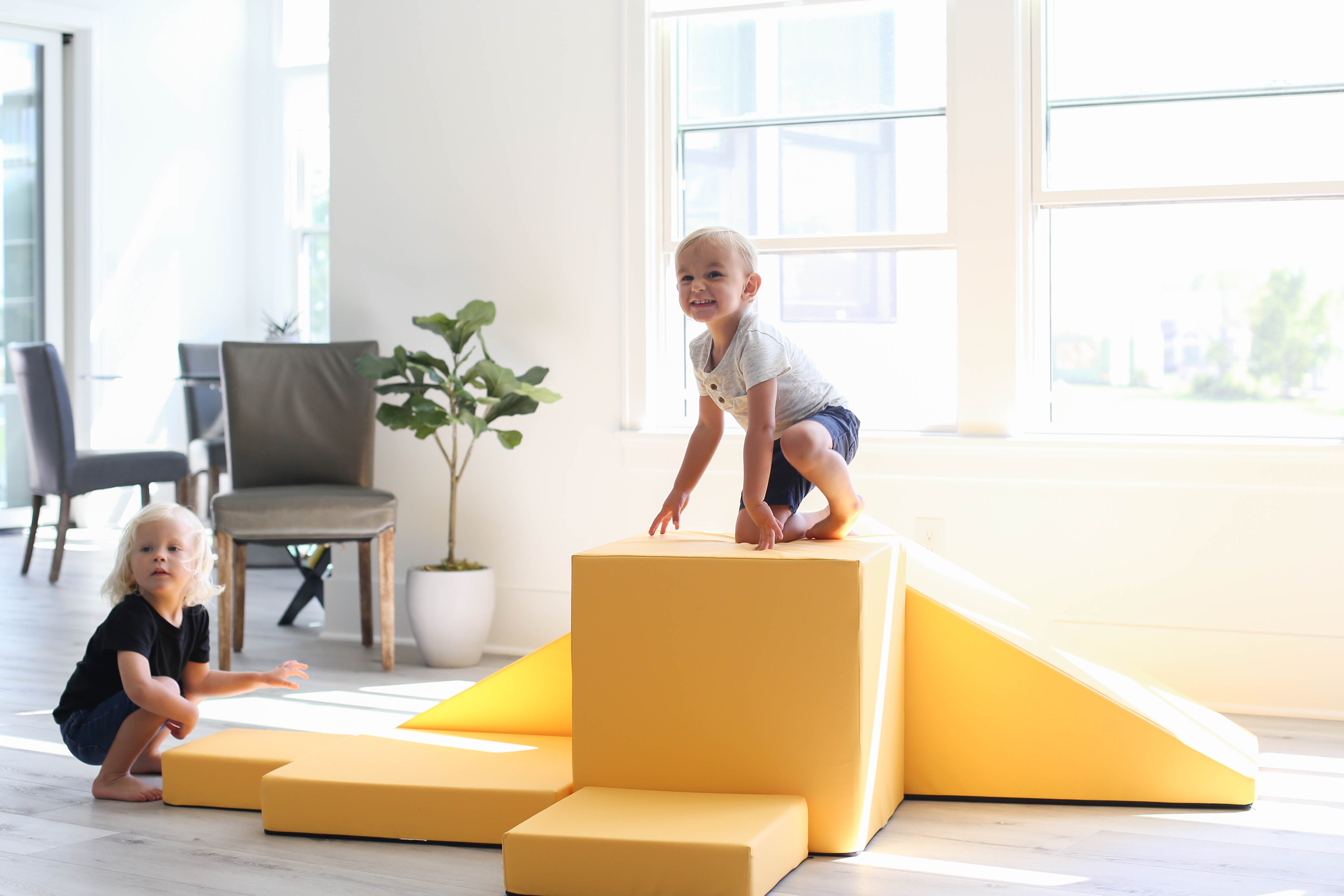 lifestyle photo of two kids playing on Foamnasium Marigold Corner Climber