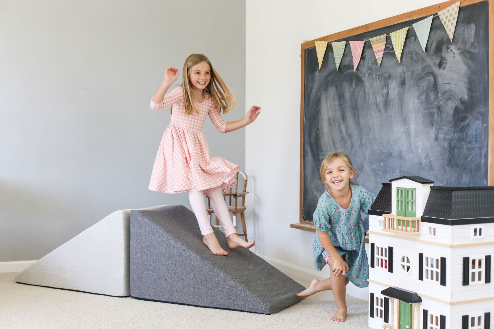 Lifestyle image of two girls playing on basketweave mega wedges