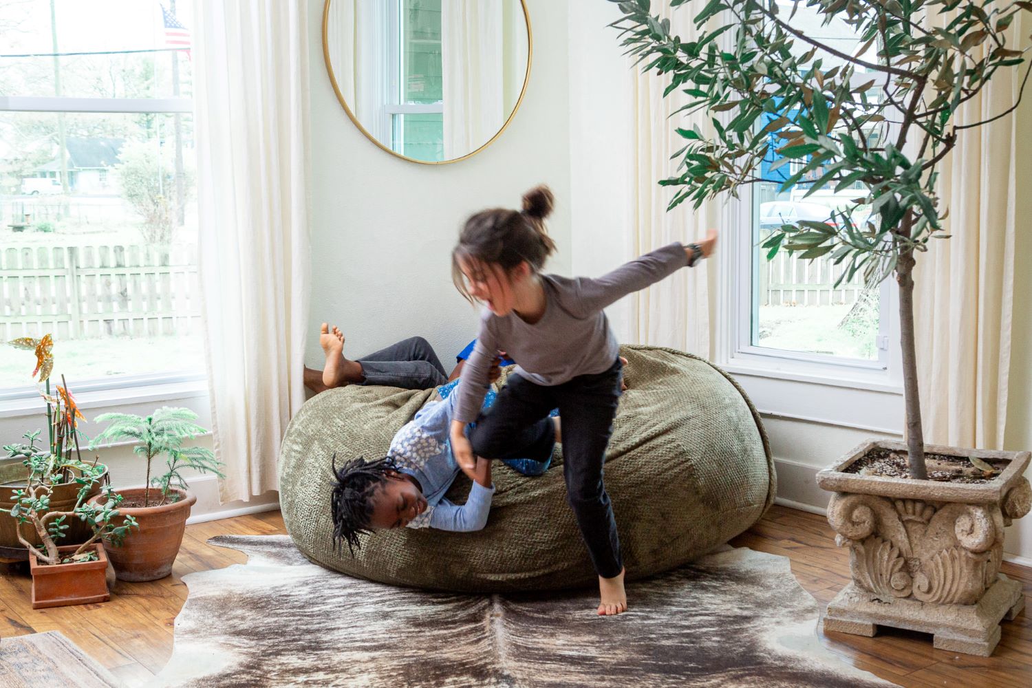 Lifestyle photo of kids jumping off a Large Sage Haven by Comfort Option