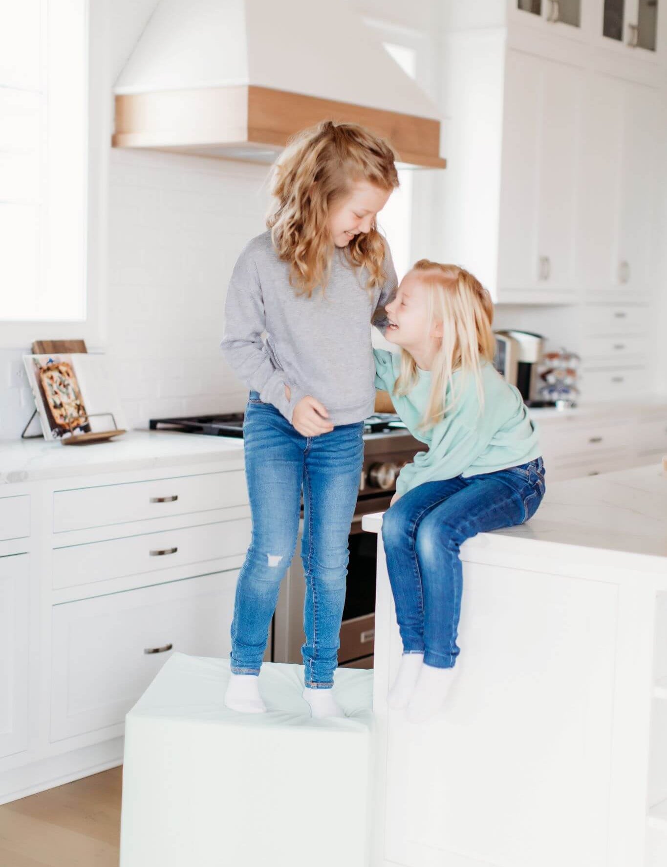 Lifestyle Photo of two girls playing on an Enhanced Sage Large Block