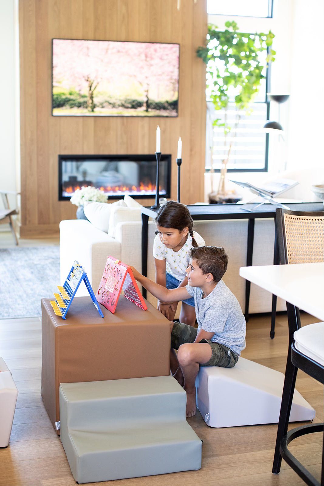 photo of two kids playing a game on foamnasium gymnasium